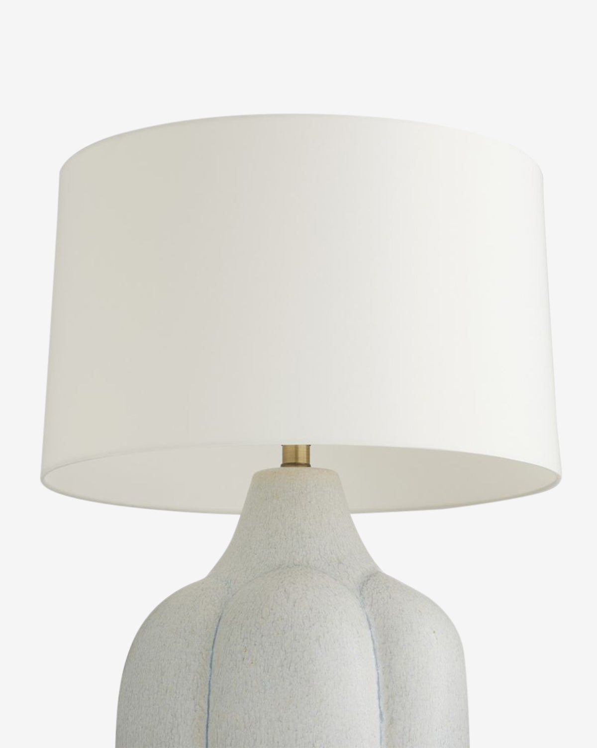 The Fig Table Lamp features a grooved ceramic base with a white textured finish and a large round white lampshade, making it an elegant addition to any home decor, by McGee & Co.