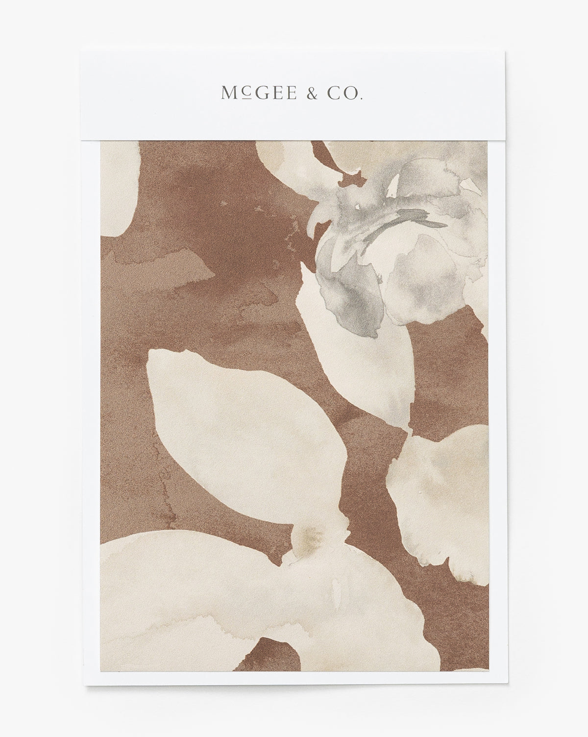 Certainly! Here is your requested sentence, with McGee & Co. blended to the end: The Fiorella Wallpaper Swatch by McGee & Co. showcases a minimal floral motif in beige and brown—an elegant, understated design accent for your home by McGee & Co.