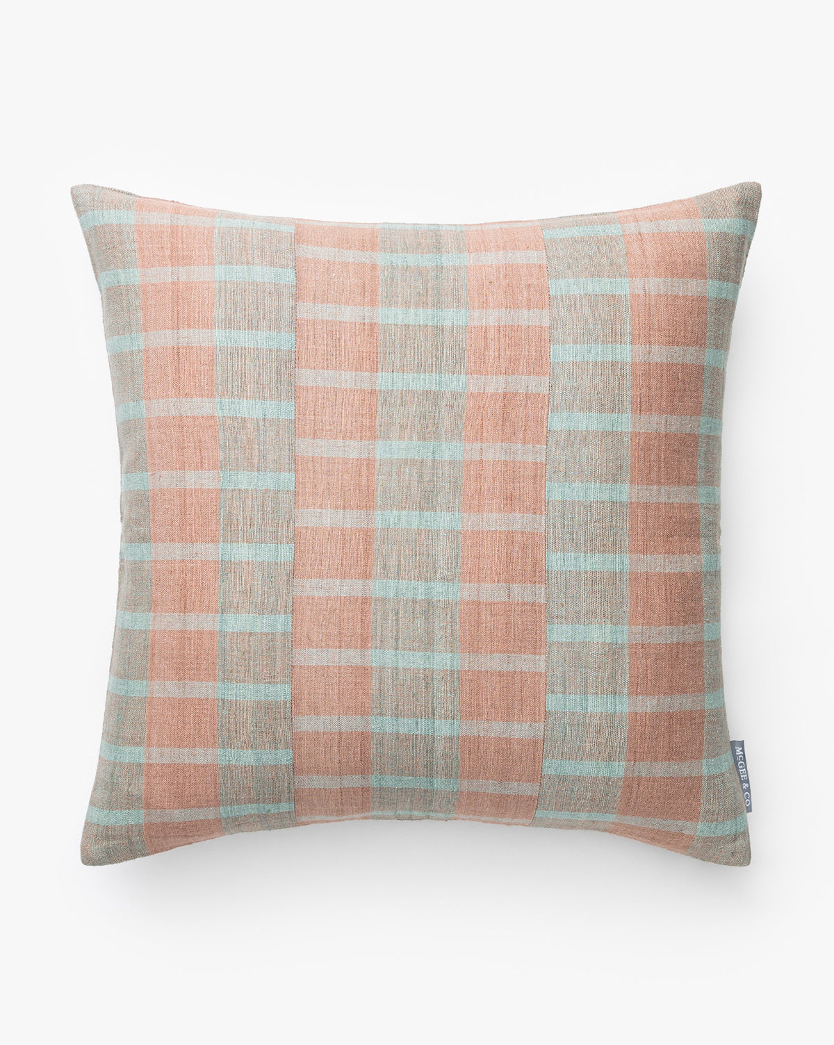The Flannery Pillow Cover features a hand-loomed woven fabric with pastel peach and light blue plaid stripes on a white background, by McGee & Co.