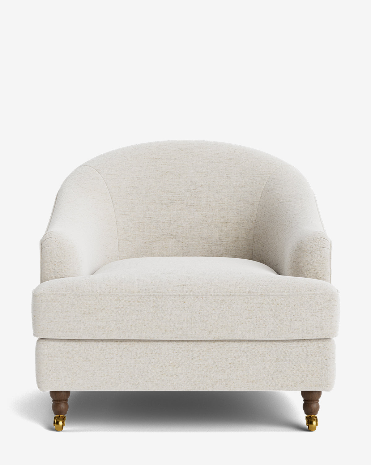 The Fletcher Lounge Chair is a plush armchair with a rounded back and arms, wooden legs, brass caster wheels, and customizable fabrics—handcrafted and shown from the front against a white background by McGee & Co.