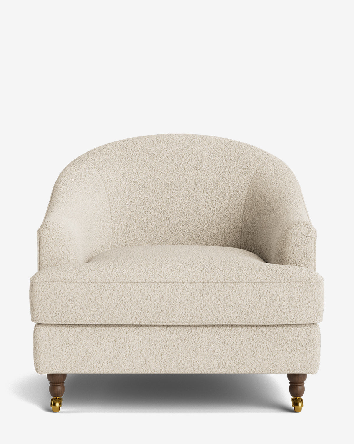 A front view of the Fletcher Lounge Chair, a plush cream armchair featuring curved armrests, customizable textured upholstery, turned wooden legs, and brass casters on the front legs by McGee & Co.