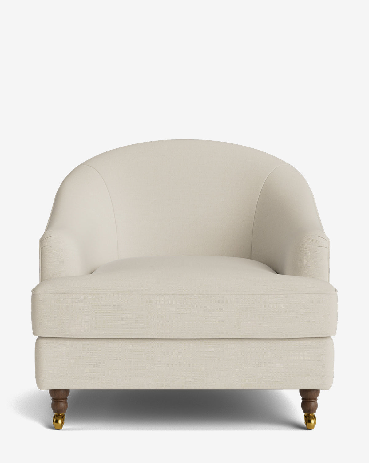 The Fletcher Lounge Chair features wide ivory upholstery, a rounded back and arms, wooden legs with front brass casters, and is shown on a white background. Handcrafted with customizable fabric options by McGee & Co.