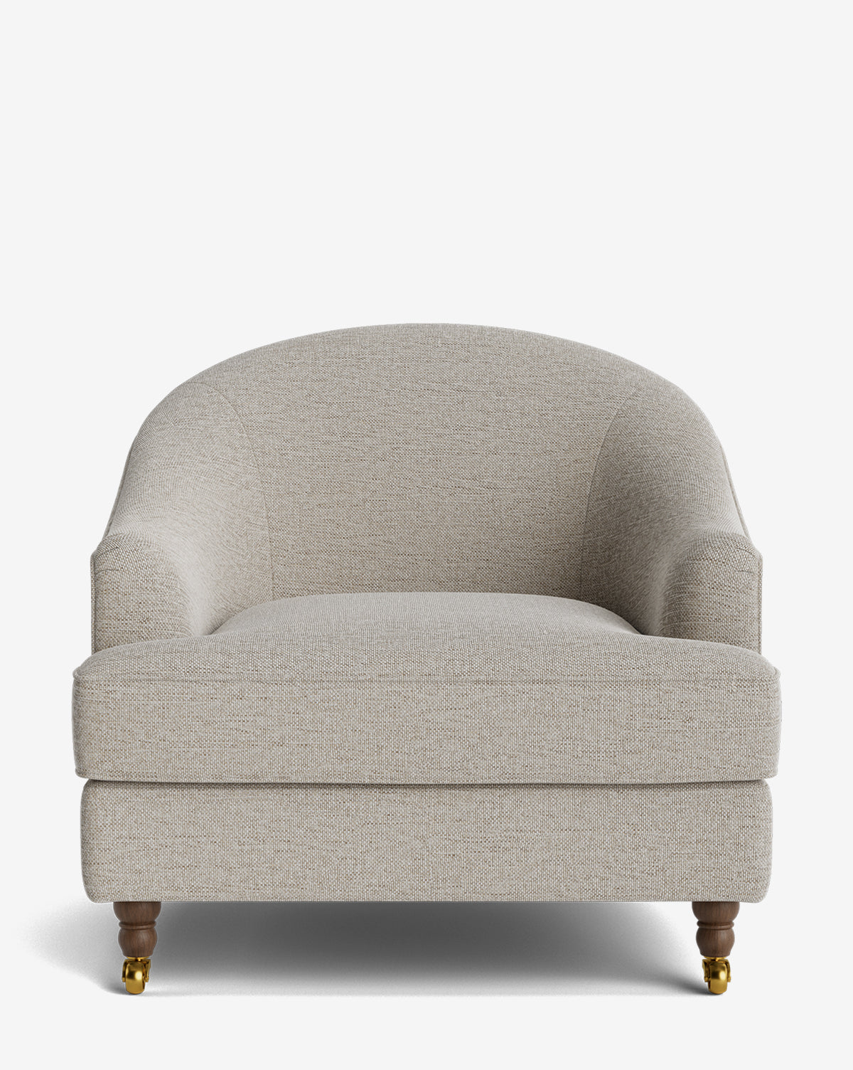 The Fletcher Lounge Chair features a plush, curved backrest, thick seat cushion, and wooden legs—fronts with brass caster wheels, rears simple and straight. Handcrafted in light beige with customizable fabrics available by McGee & Co.