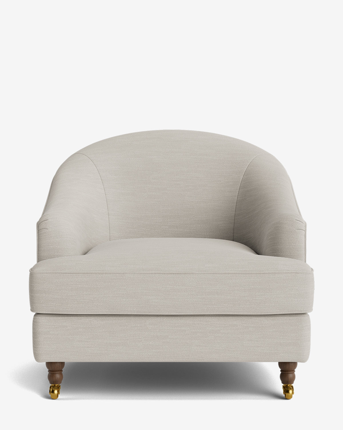 A front view of the Fletcher Lounge Chair, a modern handcrafted chair with a rounded backrest, cushioned light beige seat, and wooden legs with brass casters. Customizable fabrics available, by McGee & Co.