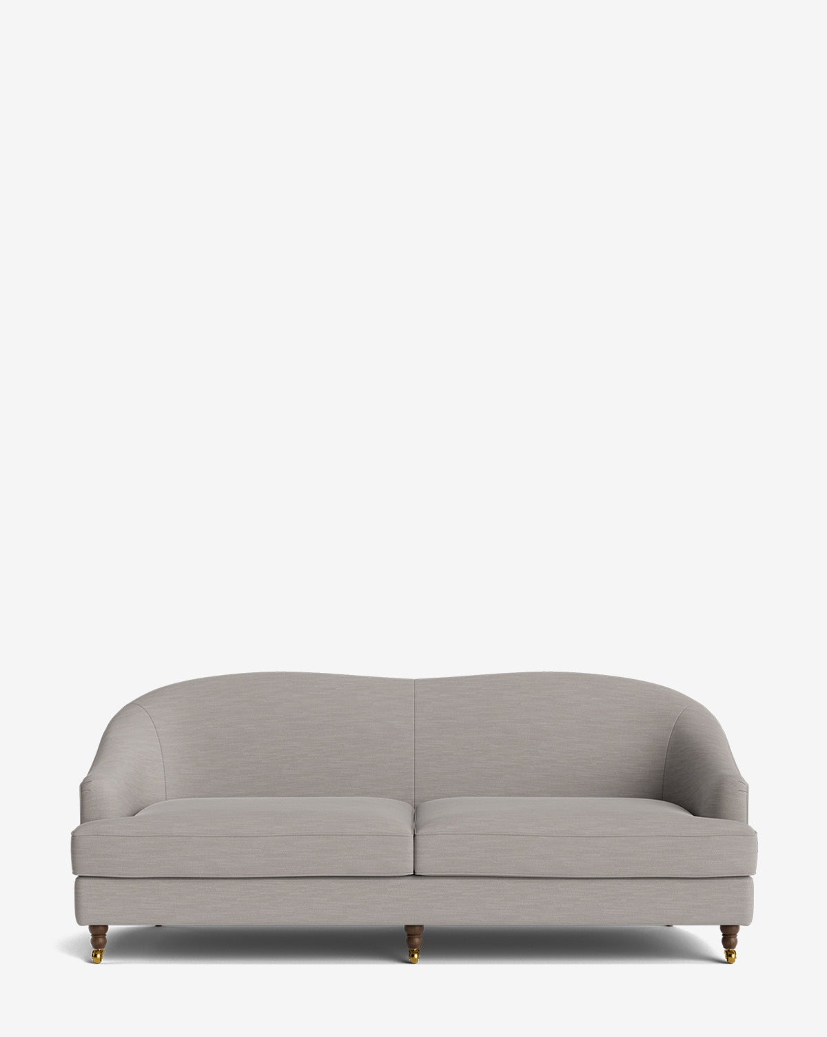 The Fletcher Sofa 76 is a light gray handcrafted sofa featuring a curved backrest, two seat cushions, and short wooden legs with brass castors, shown against a plain white background by McGee & Co.