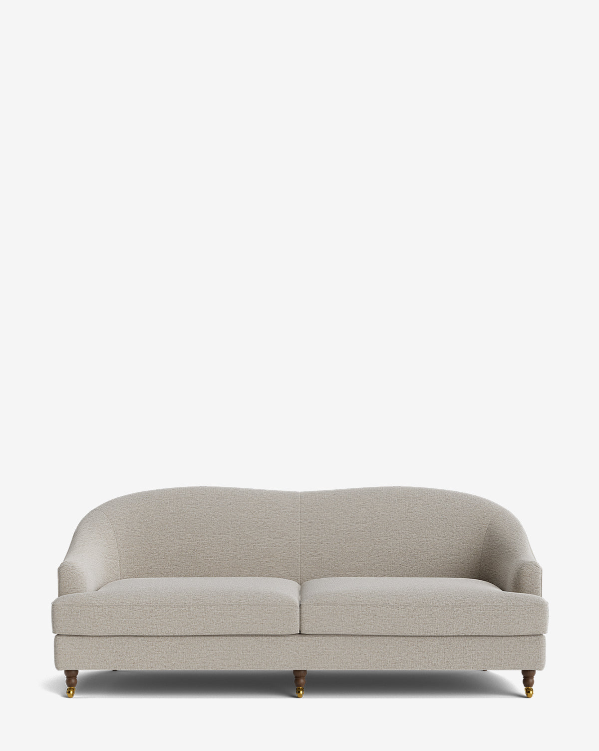 The Fletcher Sofa 76 is a light gray, upholstered, three-seater with curved arms and backrest, featuring wooden legs with brass casters. This handcrafted sofa stands elegantly against a plain white background, by McGee & Co.