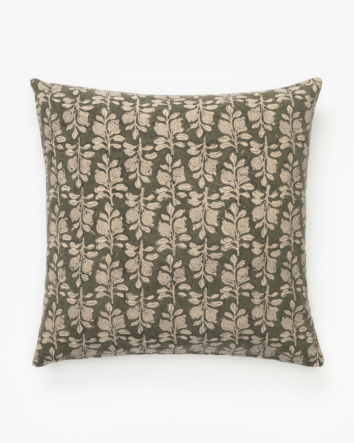 The Freya Block Print Pillow features a square cotton-linen design with an olive green background and repeating cream leaf motif, photographed on a plain white background by McGee & Co.