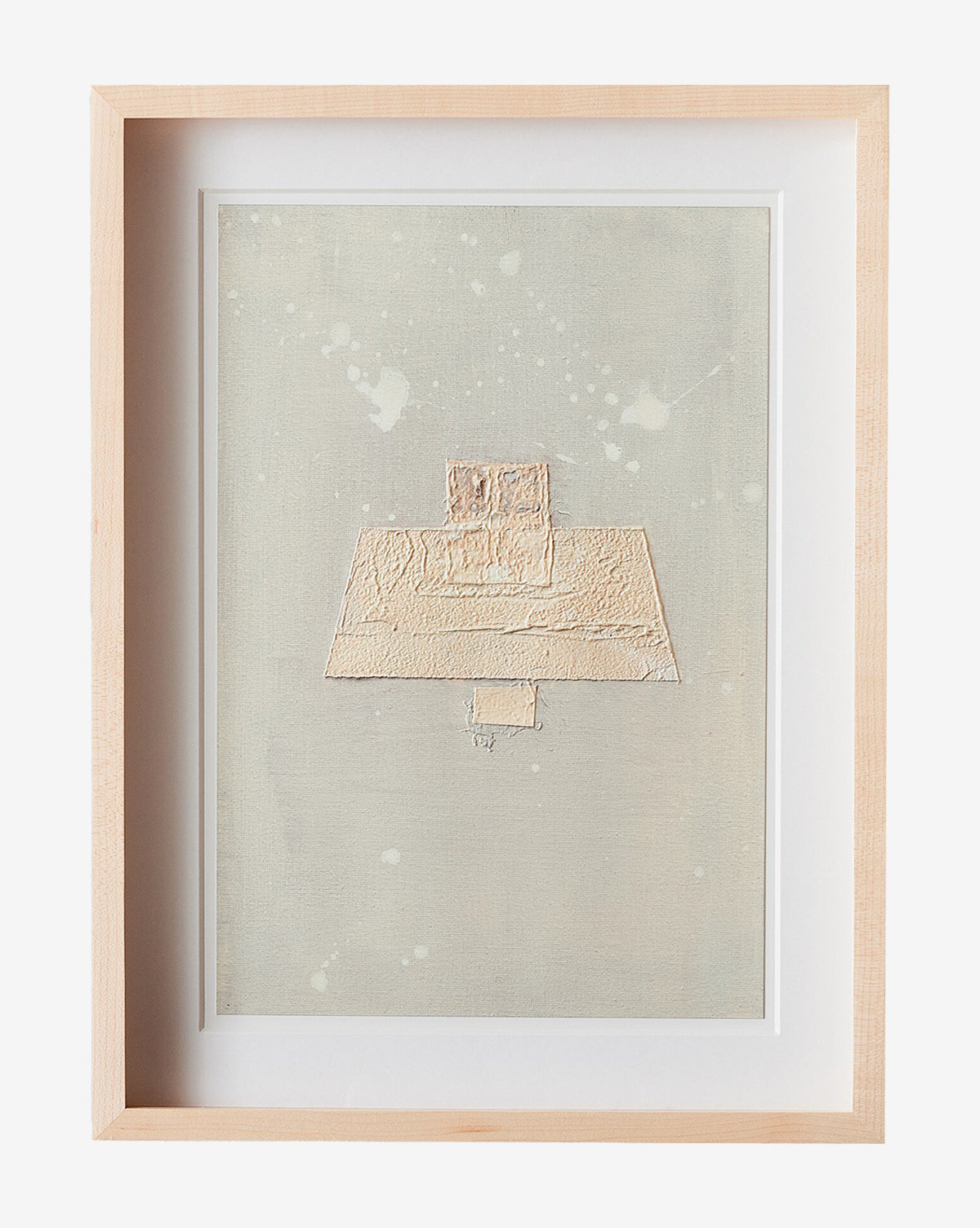 Galactic VIII by Jade Dacay is a framed minimalist artwork featuring textured beige geometric shapes on a neutral background with white splatters. This mixed media piece in a light wood frame is modern wall decor by McGee & Co.