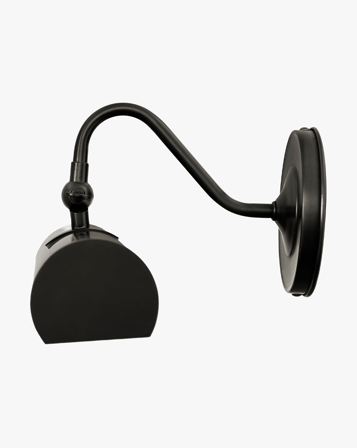 The Gallery Picture Sconce features a modern black finish, curved arm, round base, and a geometric half-cylinder shade for a sleek contemporary style, by McGee & Co.