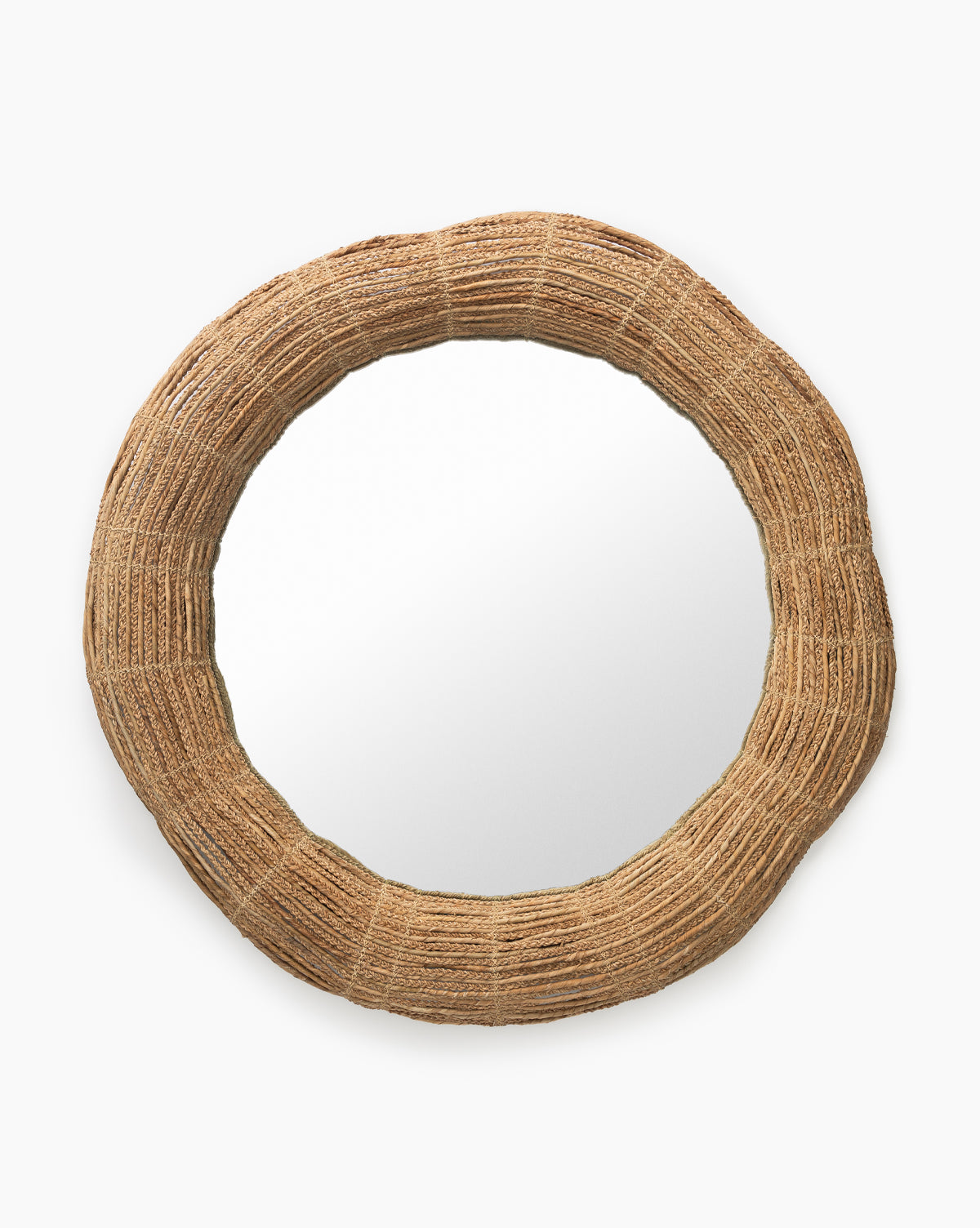 The Gareth Woven Mirror features a round design with a thick, textured frame made from natural fibers, creating a rustic, earthy look and a beautiful natural finish, by McGee & Co.