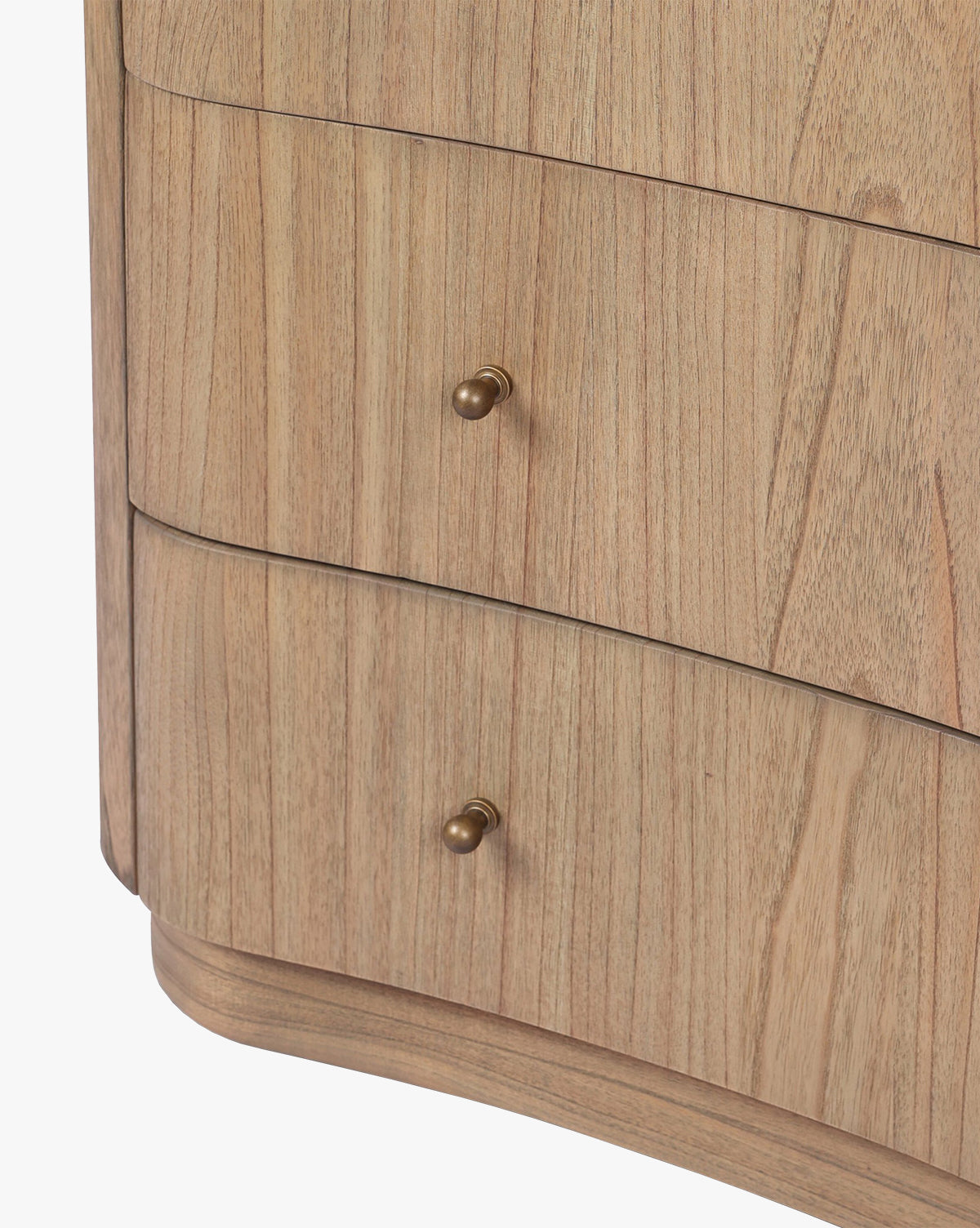 Close-up of the Gatlin Chest, crafted from solid mindi wood with a natural finish. Features two spacious drawers with round, brass-colored knobs, by McGee & Co.