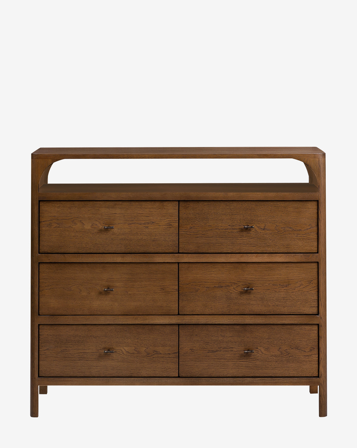 The Geneva Dresser features six drawers in two columns and three rows, an open top shelf, a medium brown wood finish, and a simple design with straight lines—ideal for modern bedroom storage, by McGee & Co.