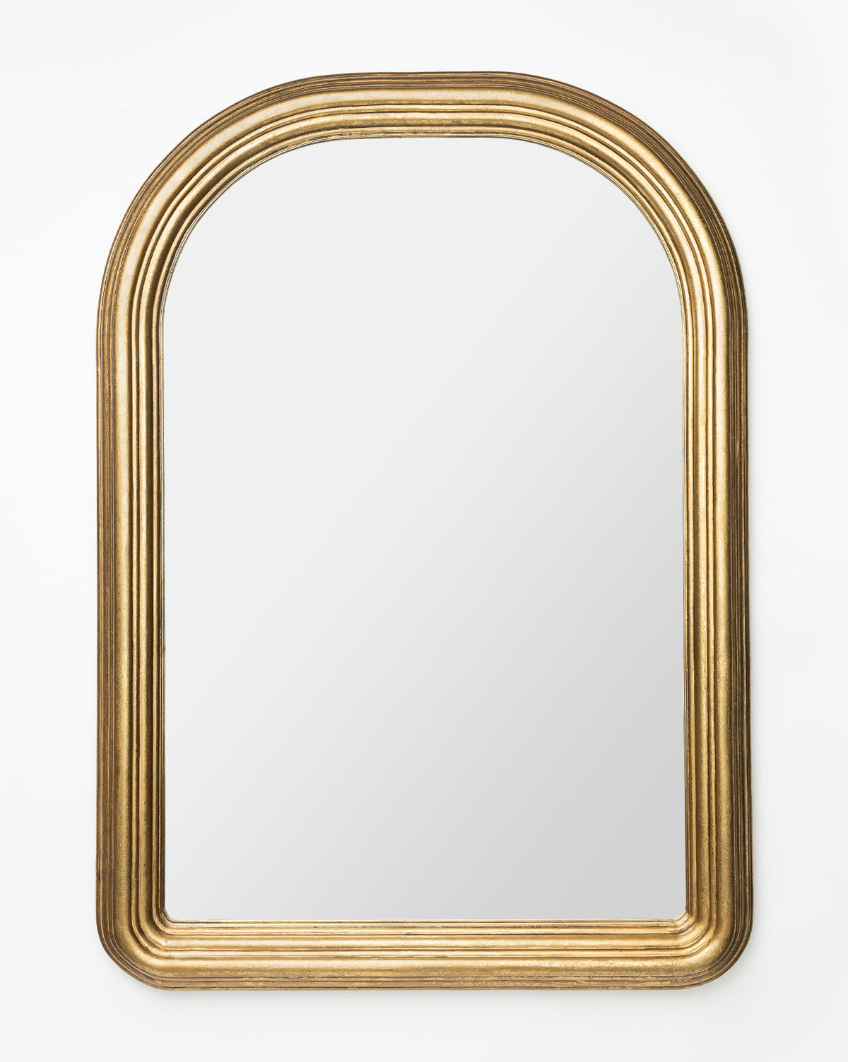 The Giada Wall Mirror, featuring a large arched design and an elegant moulded gold frame, stands against a plain white background by McGee & Co.
