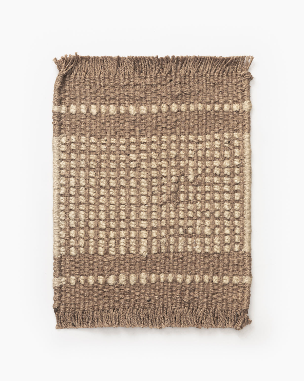 The Girona Natural Jute Rug Swatch is a rectangular, handwoven jute rug with a brown and beige checkered pattern, textured surface, and fringed edges on the shorter sides by McGee & Co.