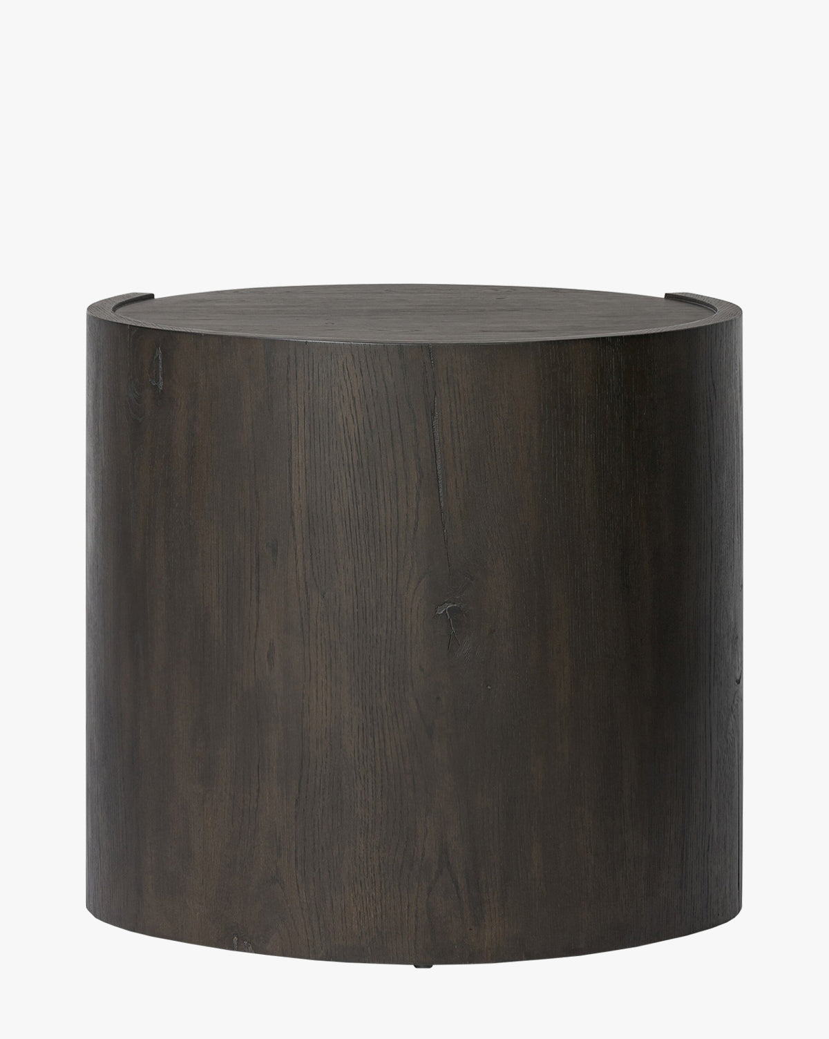 The Glenndon Oak Nightstand features a round silhouette, black finish, smooth surface, and natural wood grain texture, shown against a plain white background by McGee & Co.