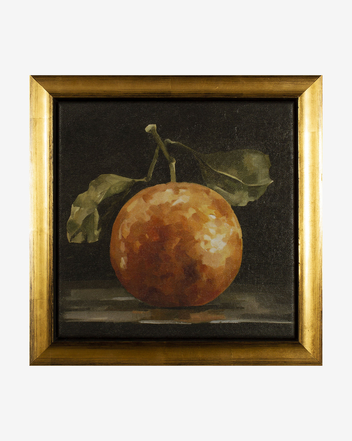 The Gloomy Clementine I framed print showcases a clementine with two green leaves on a dark background. Its simple gold frame adds a classic touch to this museum-quality, moody still life artwork.