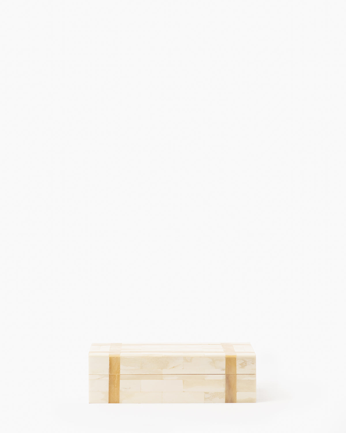 The Paige Bone Box is a rectangular, light-colored wooden box with two tan bands, shown centered near the bottom of a plain white background—ideal for storing small organic items.