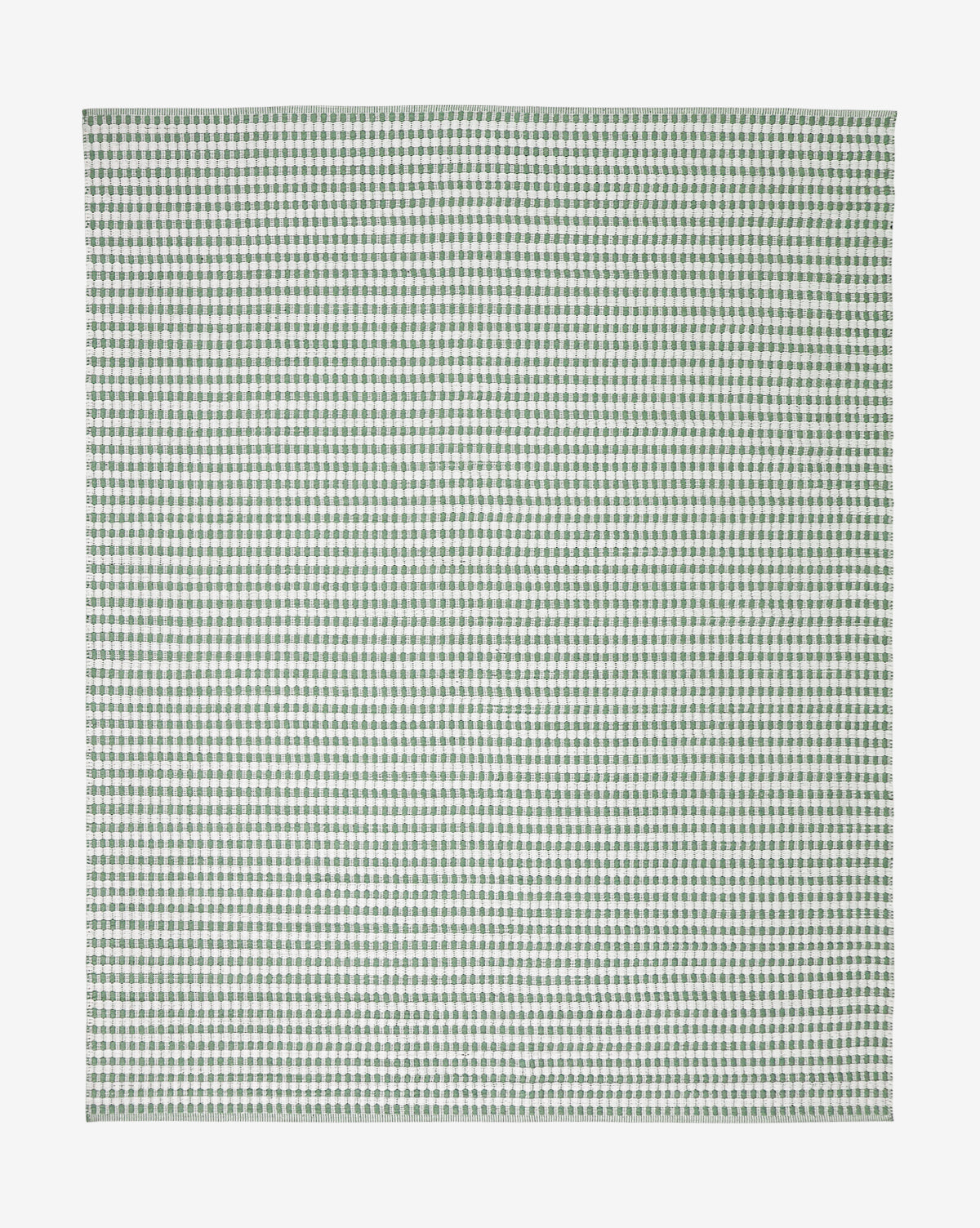 The Granada Green Handwoven Indoor/Outdoor Rug features a flat, square design with a small green and white checkered pattern on a plain white background, by McGee & Co.