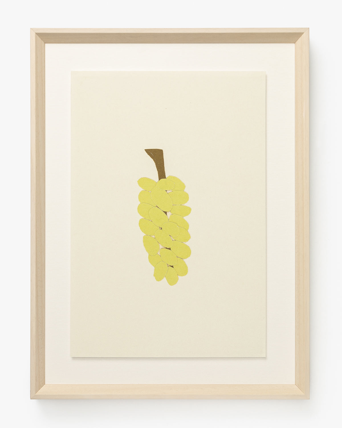 Grape Collage: This minimalist giclee print features a simple bunch of yellow grapes with a brown stem on an off-white background, framed in light wood—an ideal touch to brighten any children’s room by McGee & Co.