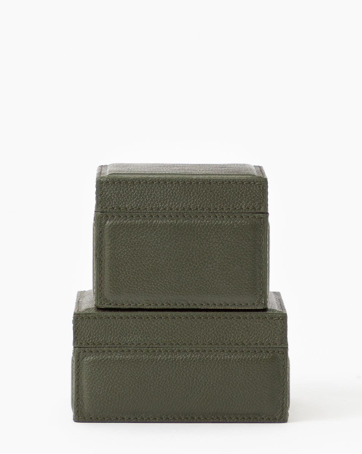 Two Green Leather Boxes are stacked against a white background. Each Green Leather Box has a textured full grain leather surface and visible stitching along the edges.