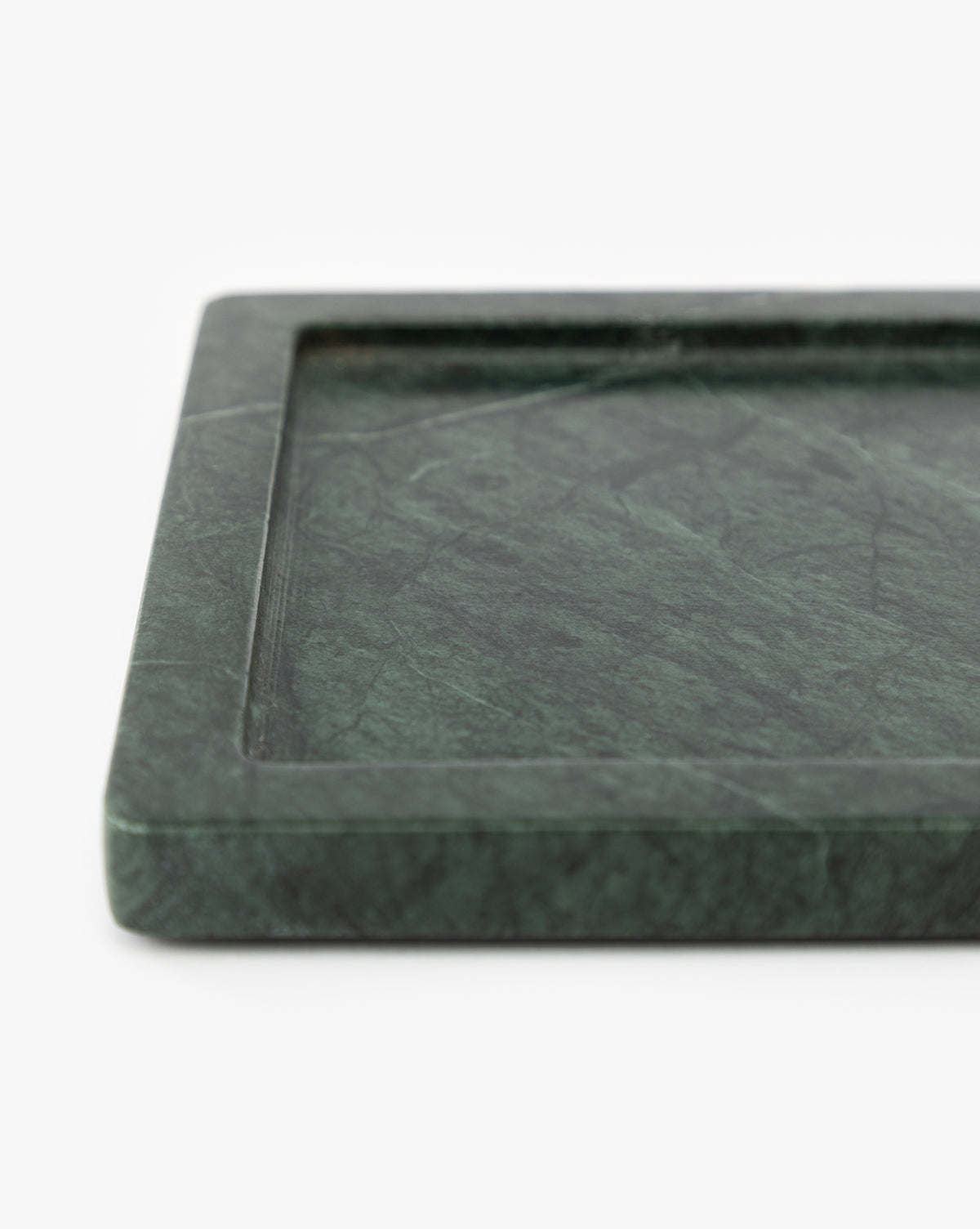 A close-up of the Green Marble Nesting Tray, featuring a shallow lip ideal for decorative vignettes, displayed on a plain white background, by McGee & Co.