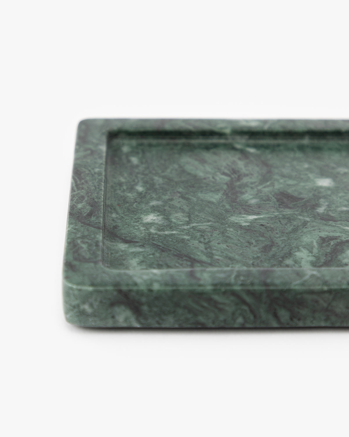A close-up of the Green Marble Nesting Tray—a rectangular tray with a recessed center—displayed on a white background, ideal for decorative vignettes, by McGee & Co.