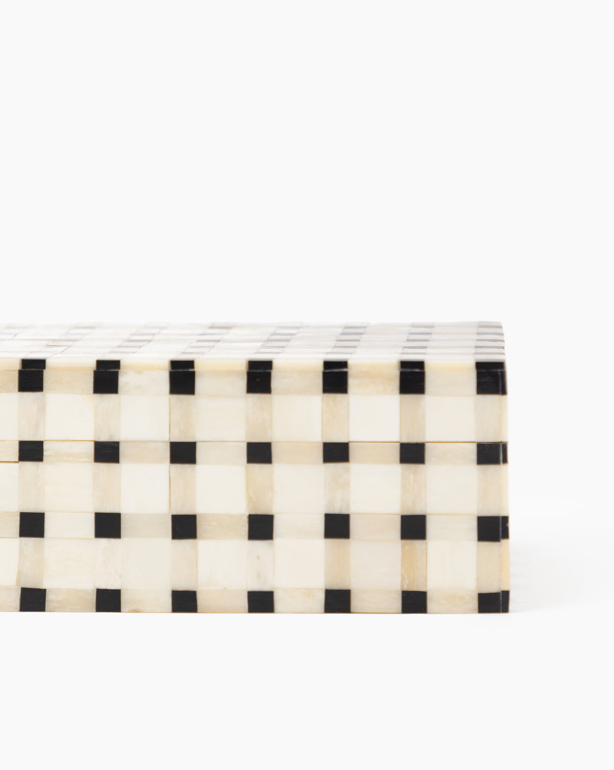 Grid Patterned Box with a black and white check design, shown partially cropped against a white background. Perfect as an entryway catch-all to complement classic home decor.