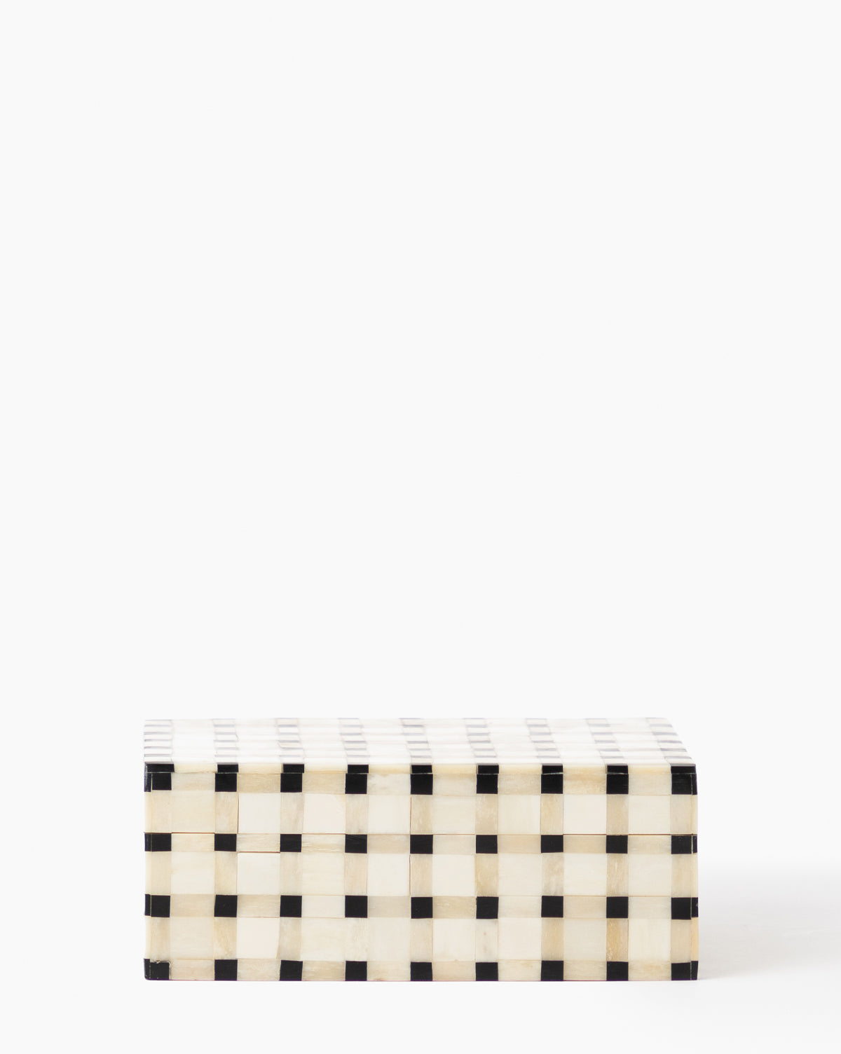 The Grid Patterned Box features a black and white checkered design, ideal as a classic home decor accent or entryway catch-all, shown on a plain white background.