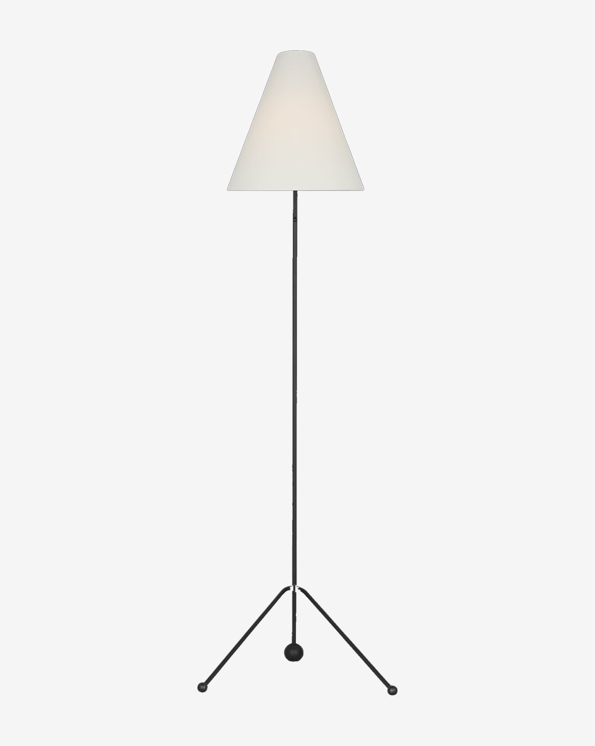 The Gustav Floor Lamp showcases a white conical shade, slender black pole, and three-legged tripod base—an ideal choice for modern interiors, by McGee & Co.