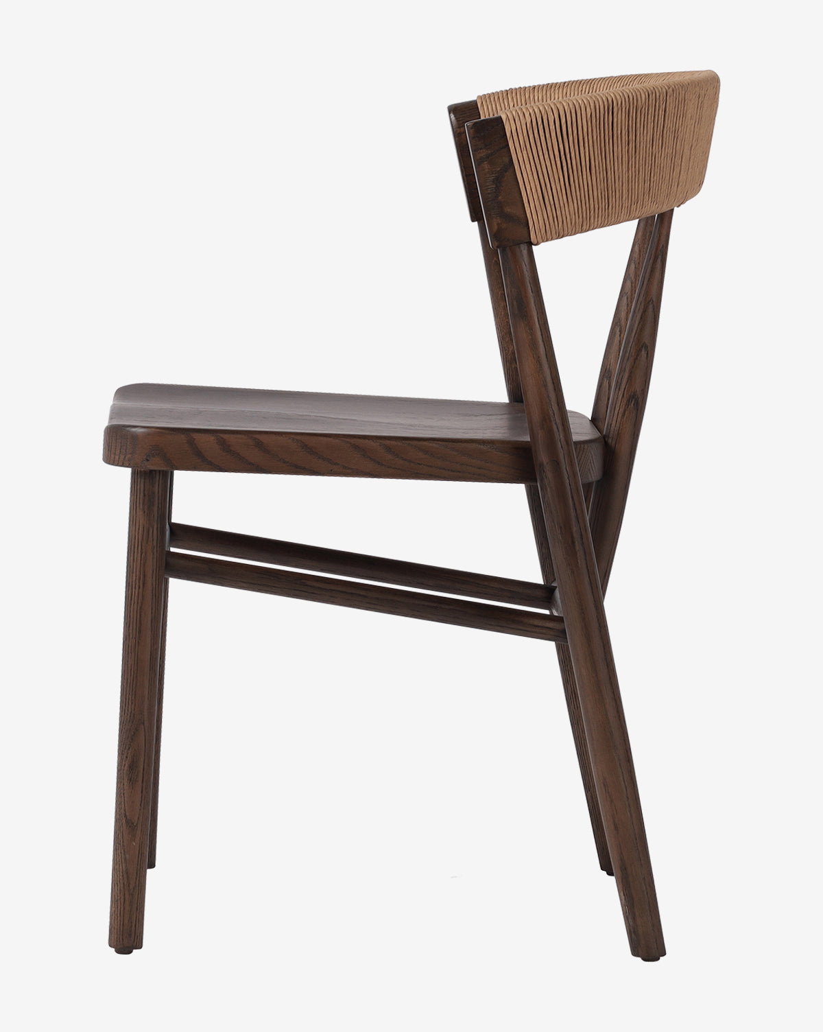 Side view of the Hallow Chair, a modern rustic dining chair with angled legs, dark brown finish, and light tan textured backrest. Its minimalist design has clean, straight lines for a stylish and timeless appeal, by McGee & Co.