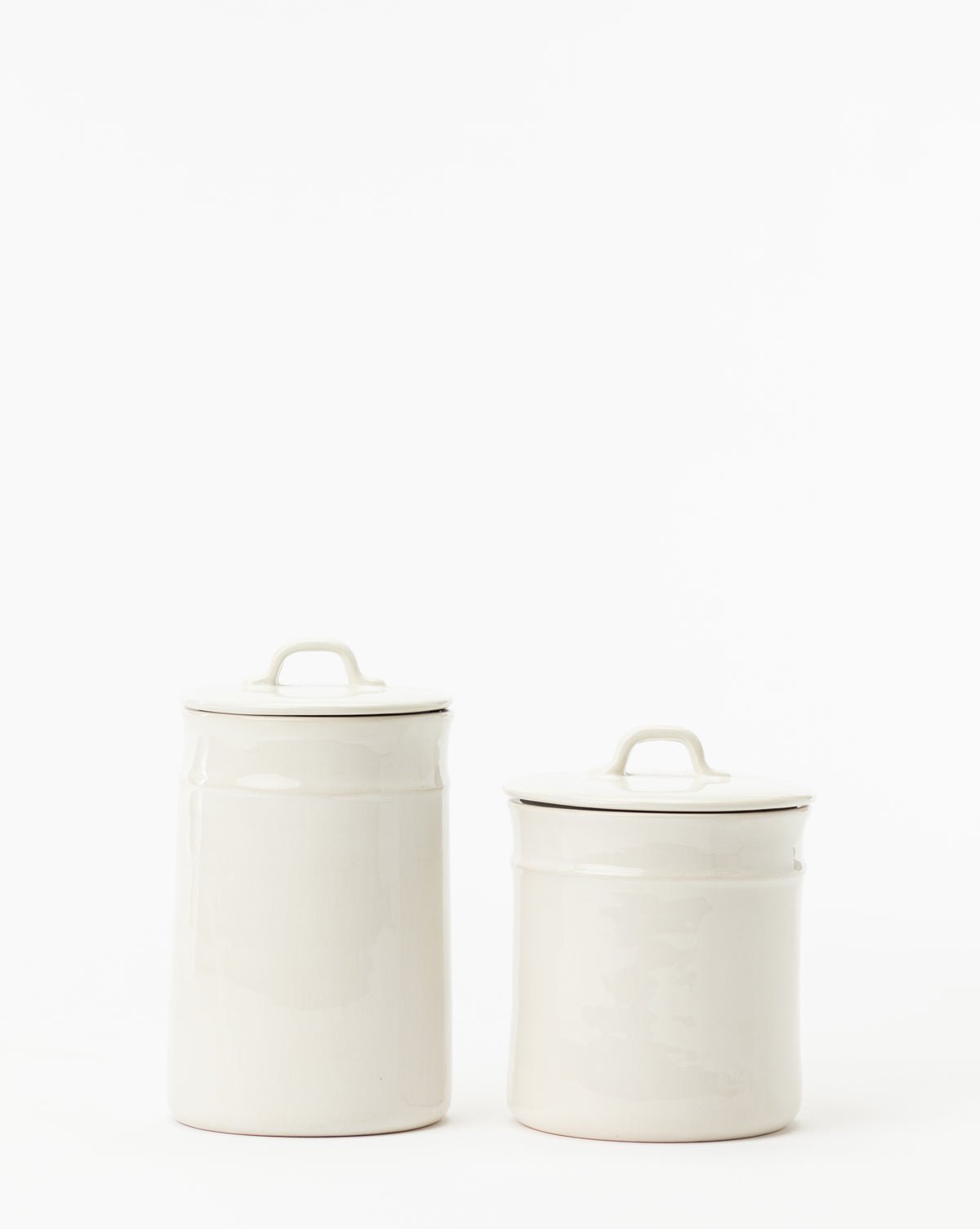Two Handled Ceramic Canisters, one tall and one short, with a modern design and white handles, are displayed side by side against a plain white background.