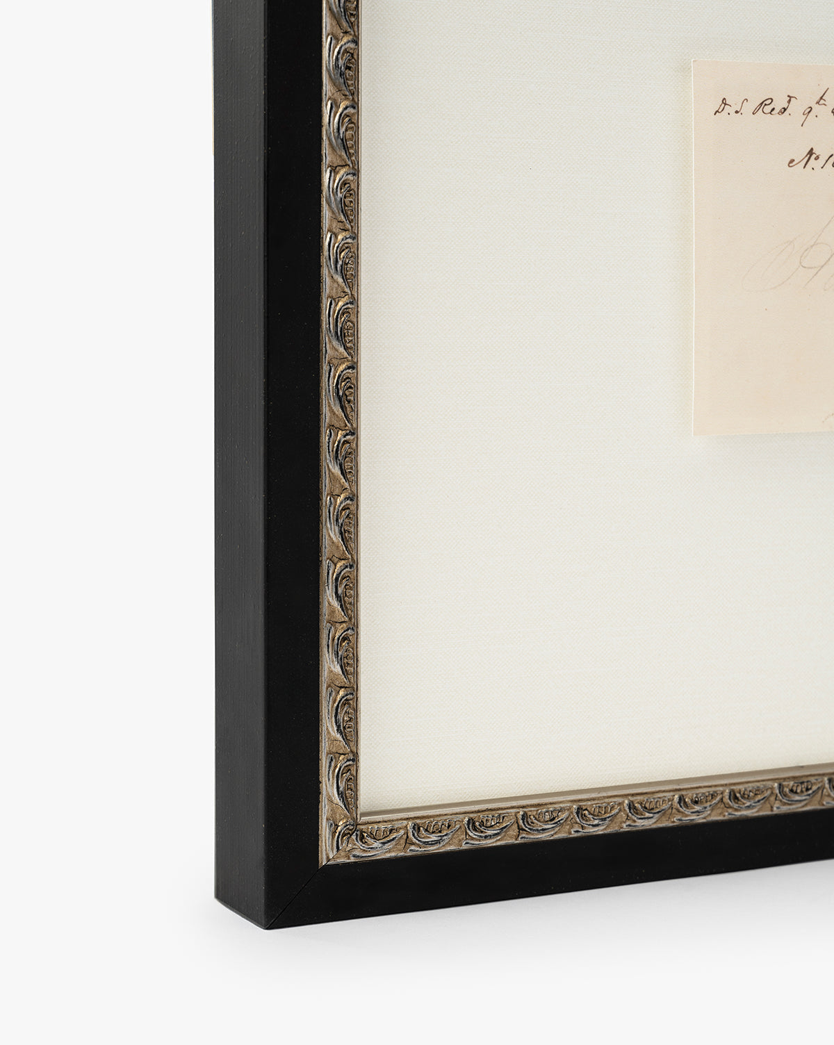 Close-up of the Hard Cider frame, featuring a black distressed wood finish, ornate inner edge, and white mat—ideal for displaying vintage art or a giclee print, by McGee & Co.