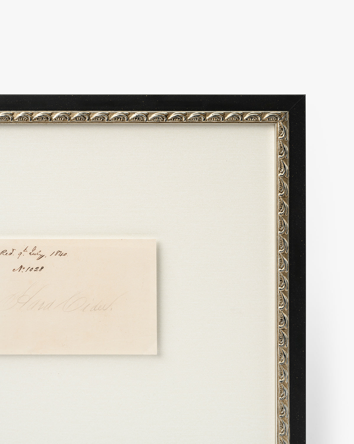 A close-up of Hard Cider in a distressed wood frame, with cream paper displaying cursive handwriting; the frame features a black outer edge and gold-toned inner trim, evoking vintage art by McGee & Co.