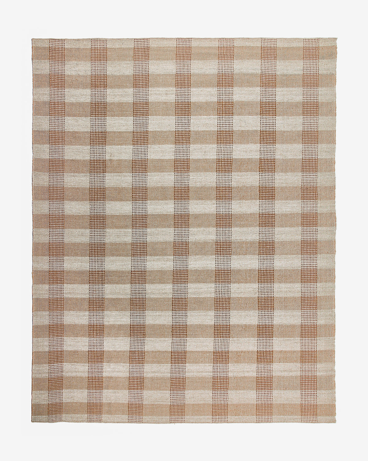 The Hargrove Handwoven Indoor/Outdoor Rug features a rectangular beige and brown plaid checker pattern, crafted from PET fibers. This stylish rug stands out against a plain white background.