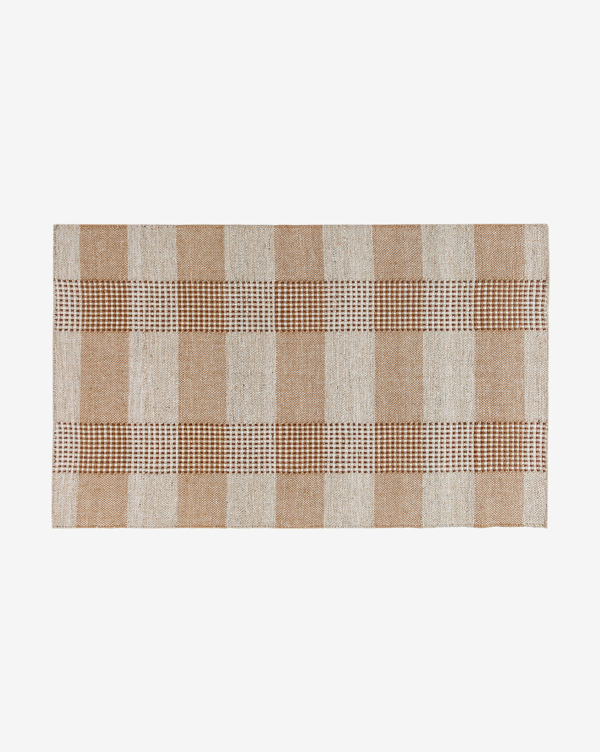 The Hargrove Handwoven Indoor/Outdoor Rug features a tan and cream checker pattern with two horizontal lines of small brown and white checks near the center, set on a plain white background.
