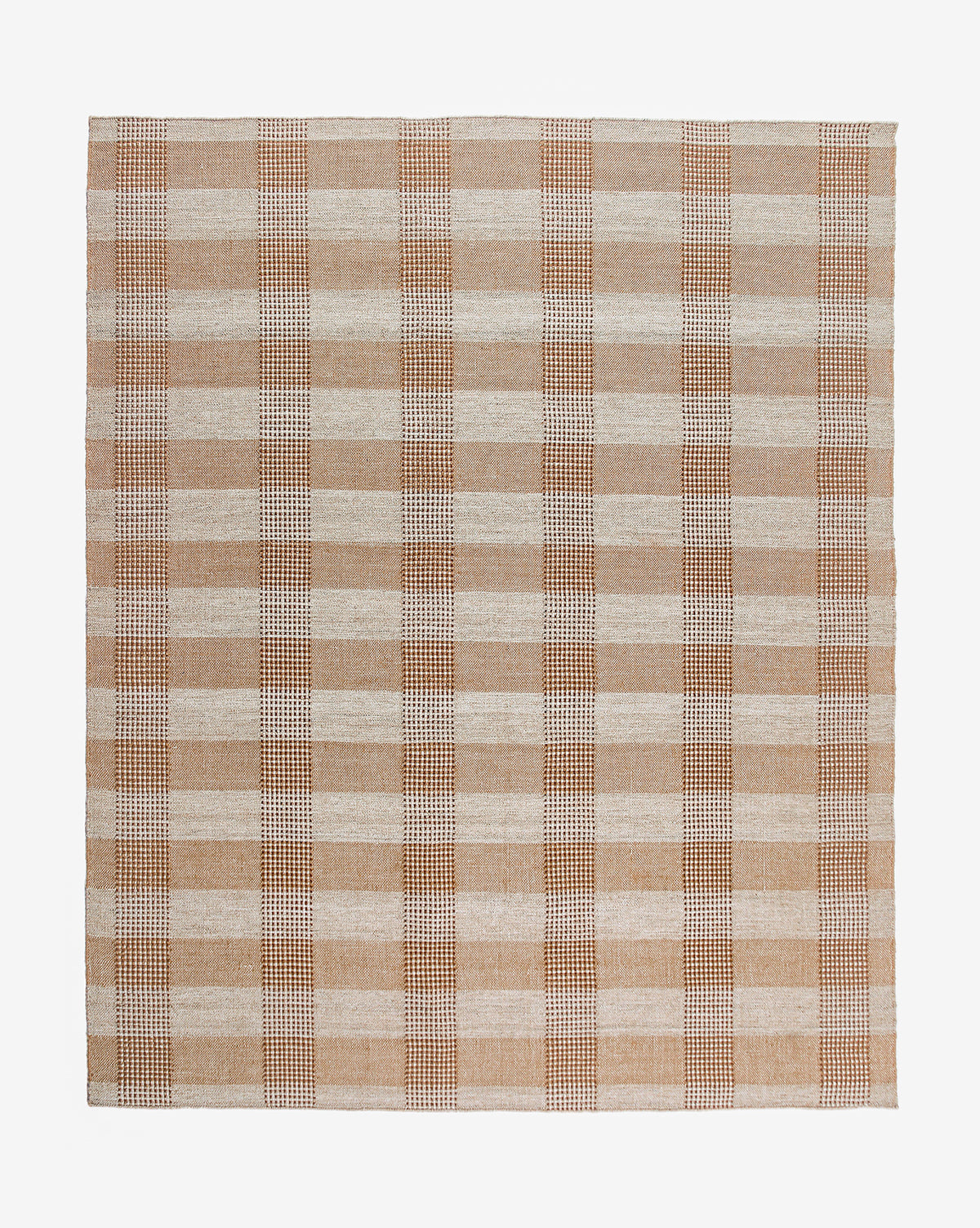 The Hargrove Handwoven Indoor/Outdoor Rug features a classic beige, tan, and light brown checker pattern in a plaid look. Made from durable PET fibers, it’s perfect for versatile spaces indoors or out.