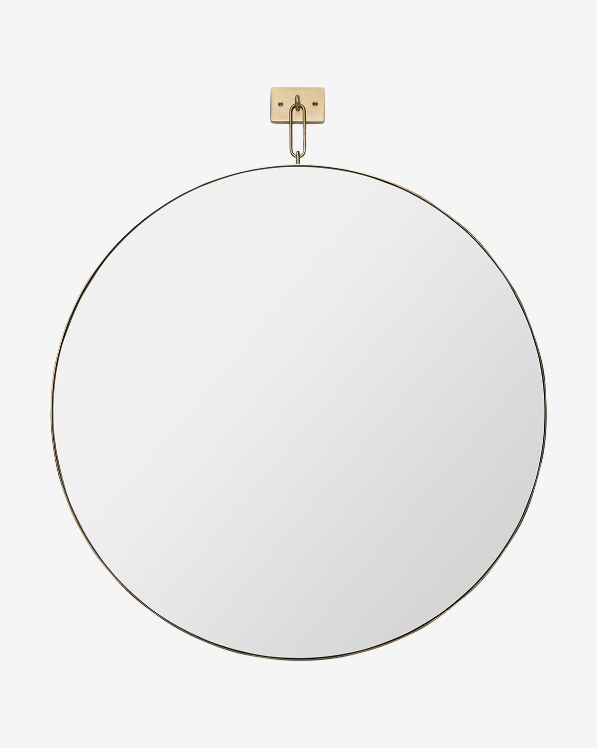 The Haven Wall Mirror is a large, round modern mirror with a slim black frame, hanging from a brass hook on a rectangular brass wall mount, shown against a white background by McGee & Co.