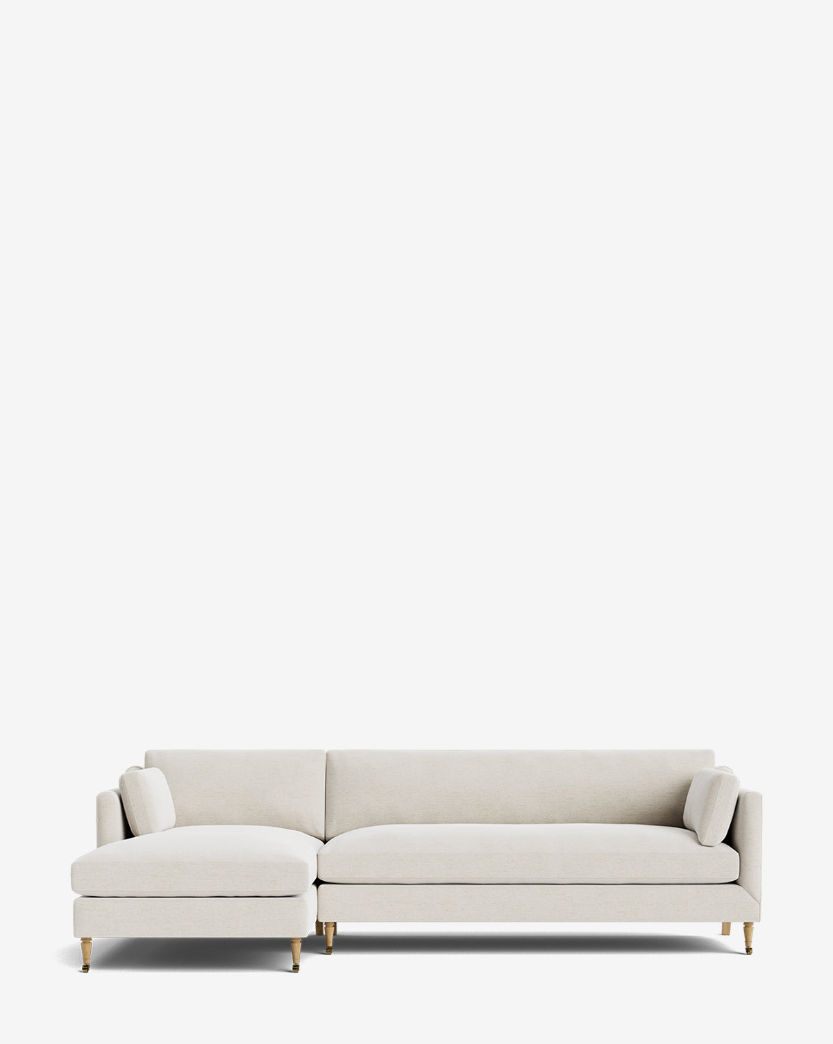 The Haverford Upholstered Left Chaise Sectional by Rowe Fine Furniture features light beige upholstery, slim cushions, and gold-capped wooden legs, shown against a plain white background. McGee & Co.