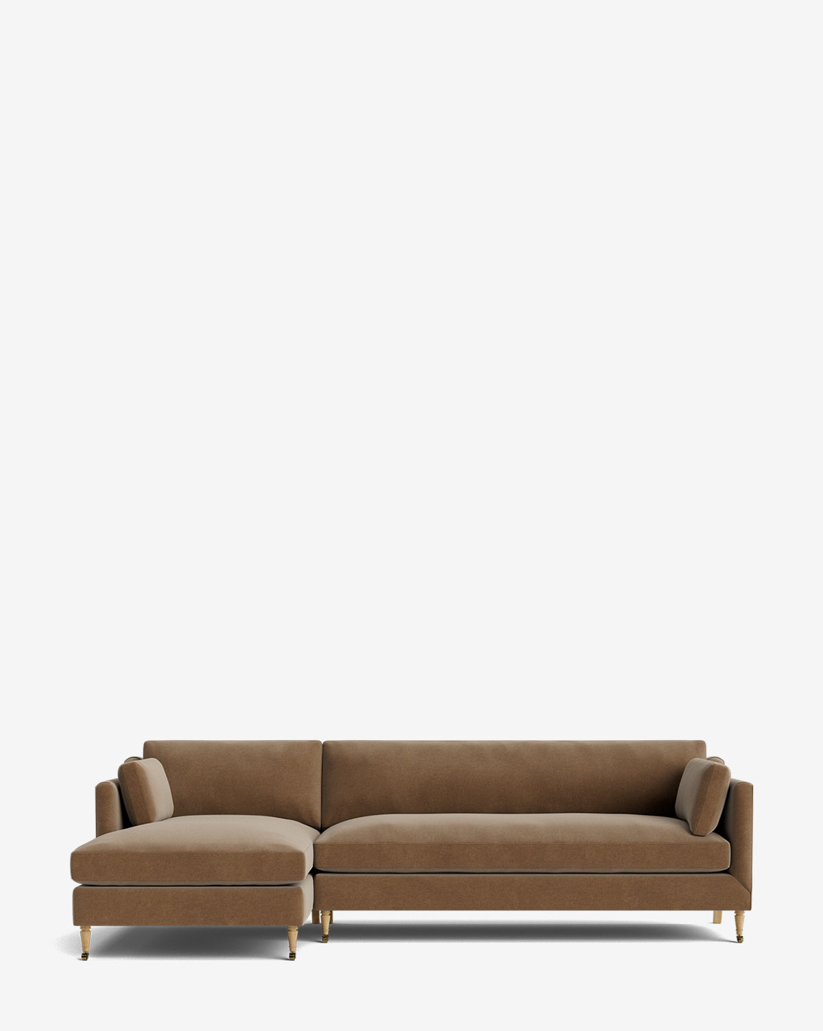 The Haverford Upholstered Left Chaise Sectional 113 is a modern brown customizable sofa with slim gold legs and two matching bolster pillows, shown against a plain white background, by McGee & Co.