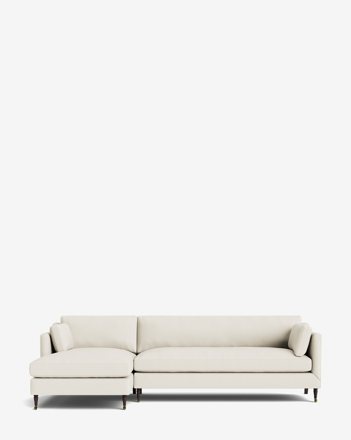 The Haverford Upholstered Left Chaise Sectional features a modern, light beige design with slim armrests and wooden legs, shown against a plain white background by McGee & Co.