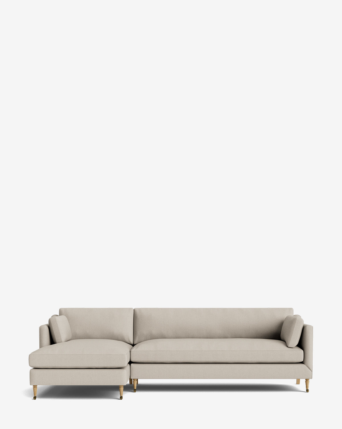 The Haverford Upholstered Left Chaise Sectional in light beige features slim cushions and short wooden legs, displayed against a plain white background, by McGee & Co.