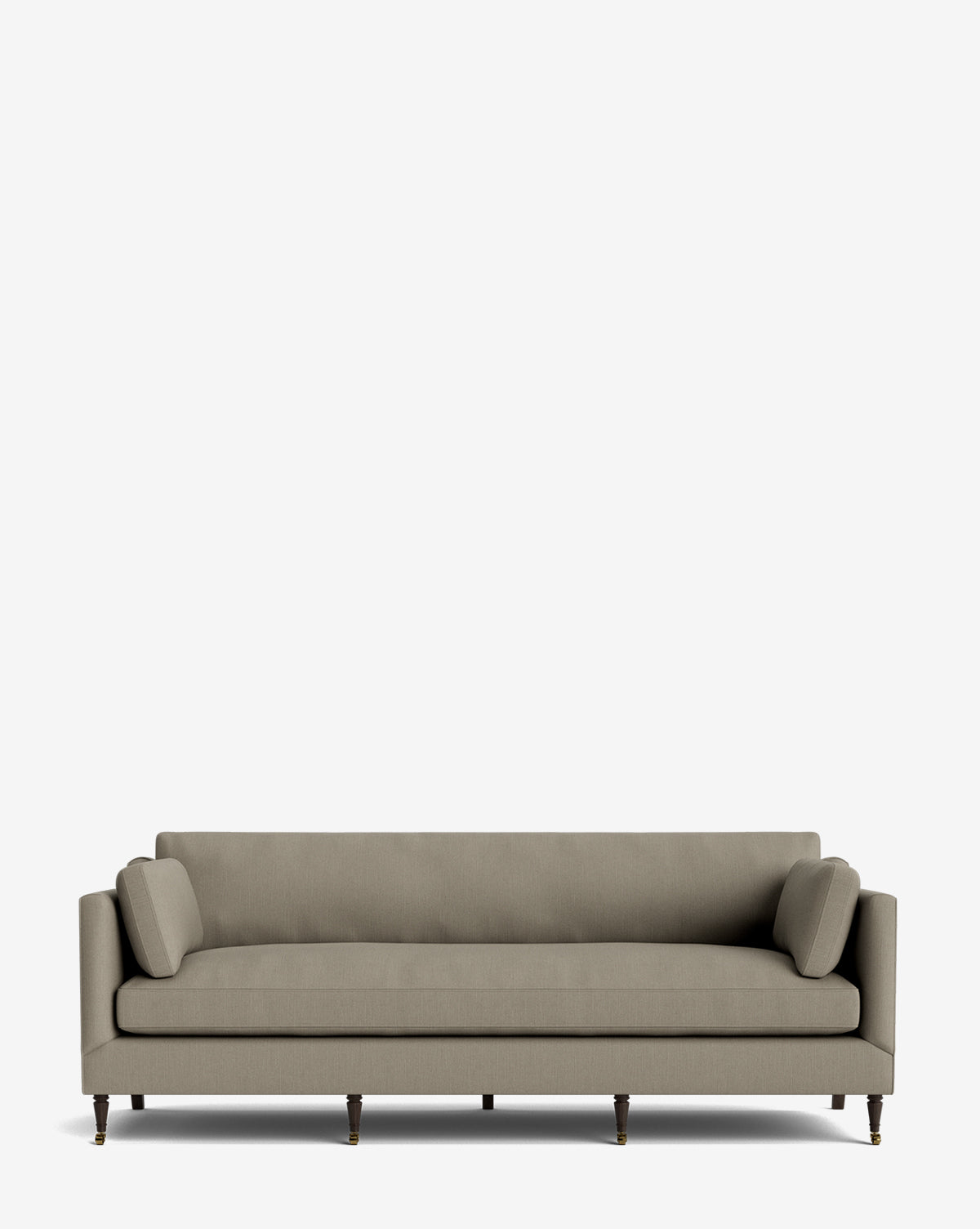 A modern, light gray Haverford Upholstered Sofa 90 with two cylindrical bolster pillows and slender wooden legs, set against a plain white background, by McGee & Co.
