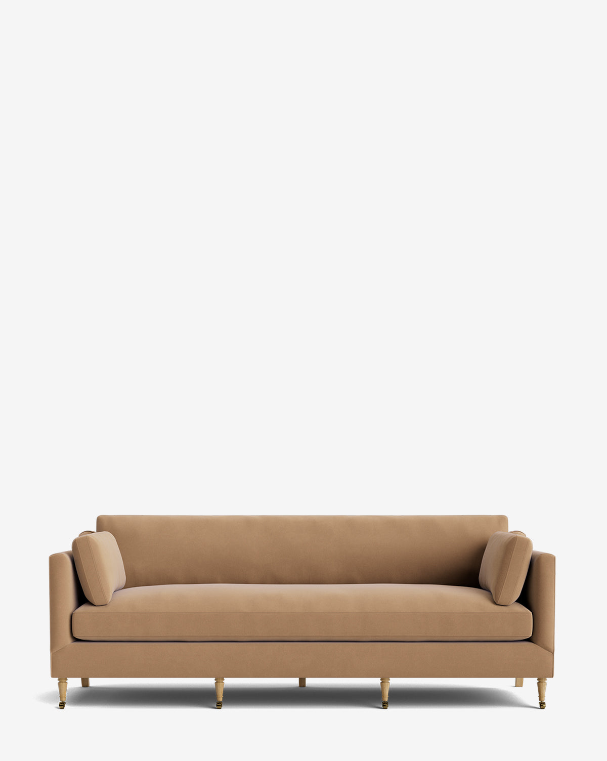 A tan, modern Haverford Upholstered Sofa 90 features clean lines, four wooden legs with gold tips, and two matching cylindrical cushions, shown against a plain white background by McGee & Co.