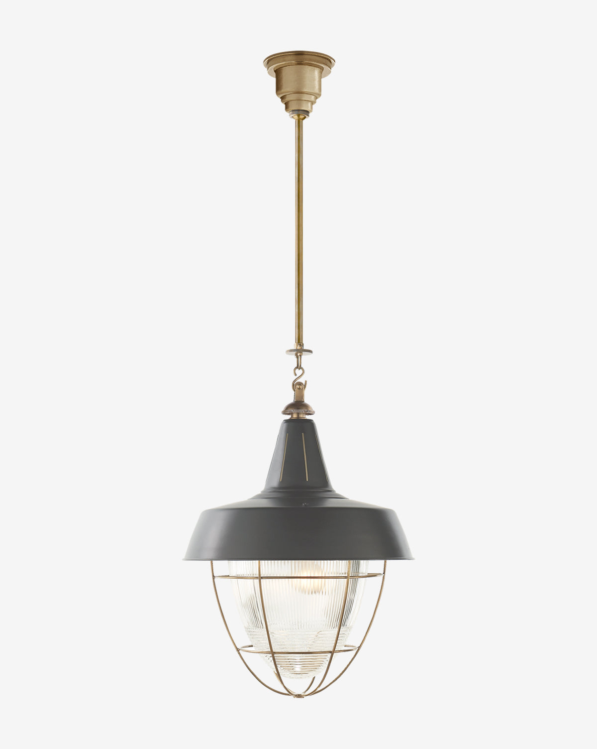 The Henry Industrial Hanging Light features a black and brass finish, domed metal shade, prismatic glass diffuser, and wire cage suspended from a brass rod and ceiling mount for rustic lighting style, by McGee & Co.