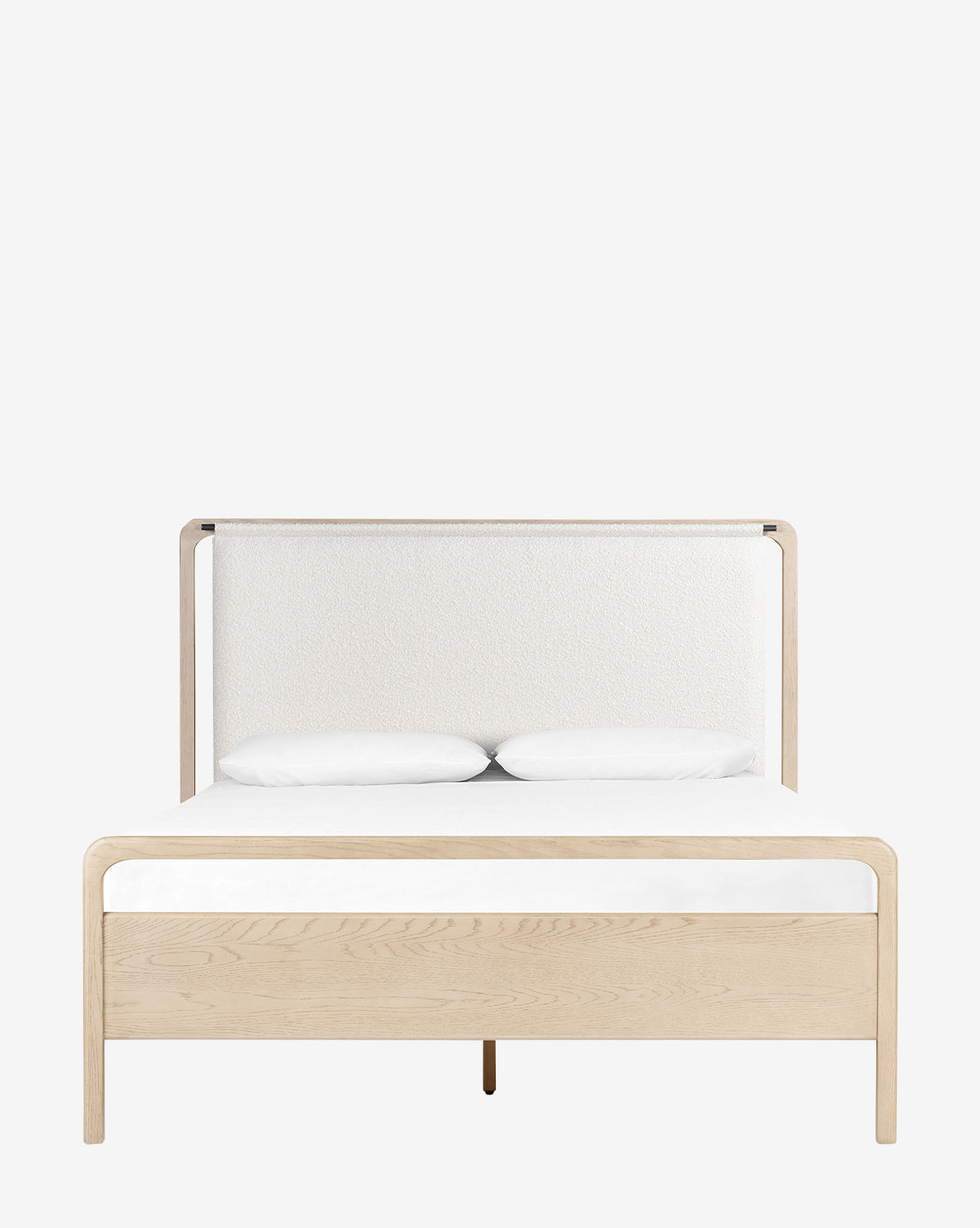 The Hensley Bed features a modern light wood frame, a white leather headboard, and comes with two white pillows on a white mattress, shown against a plain white background.