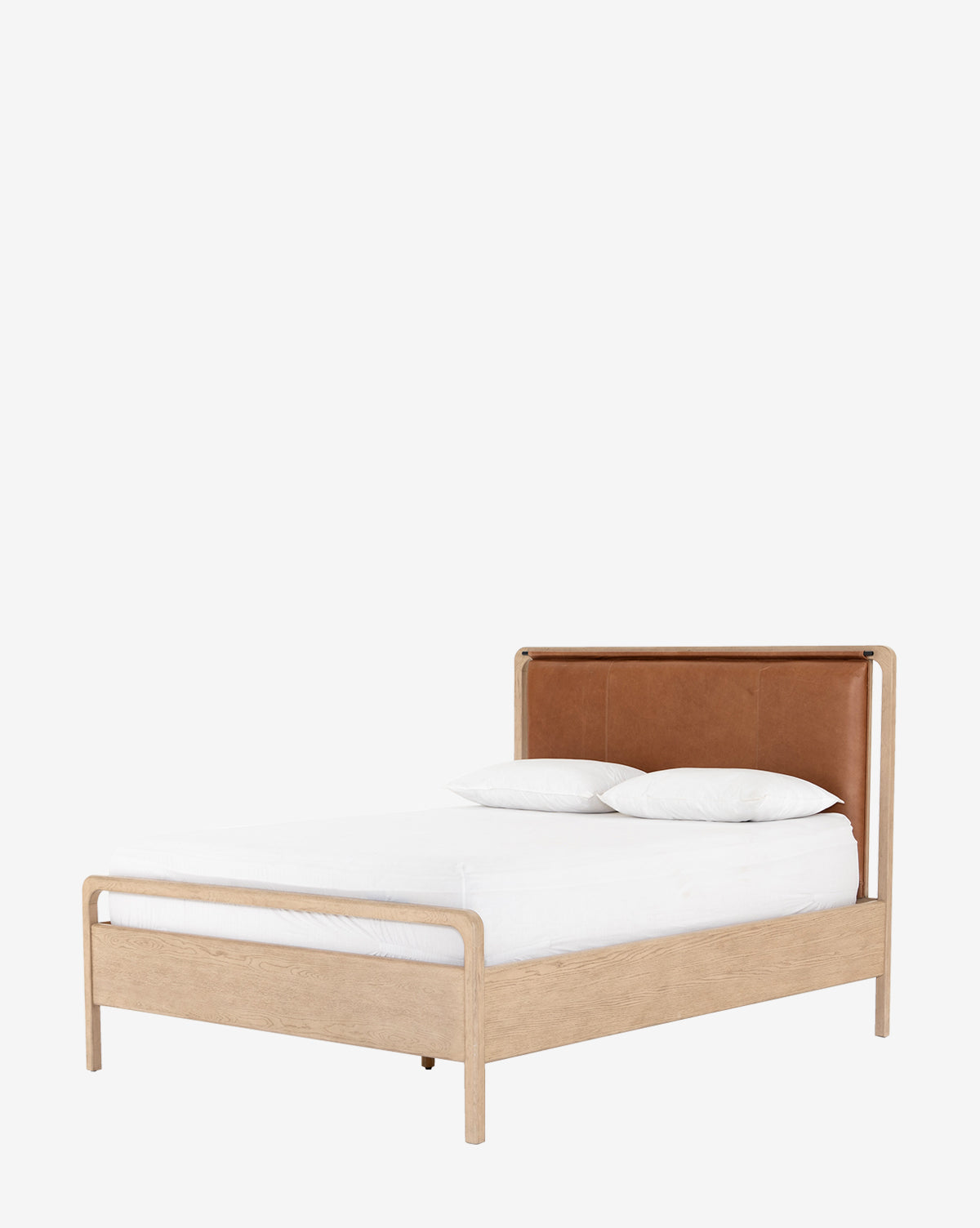 The Hensley Bed showcases a modern look with a light wood frame, brown leather headboard, white bedding, and two white pillows—all against a plain white background.