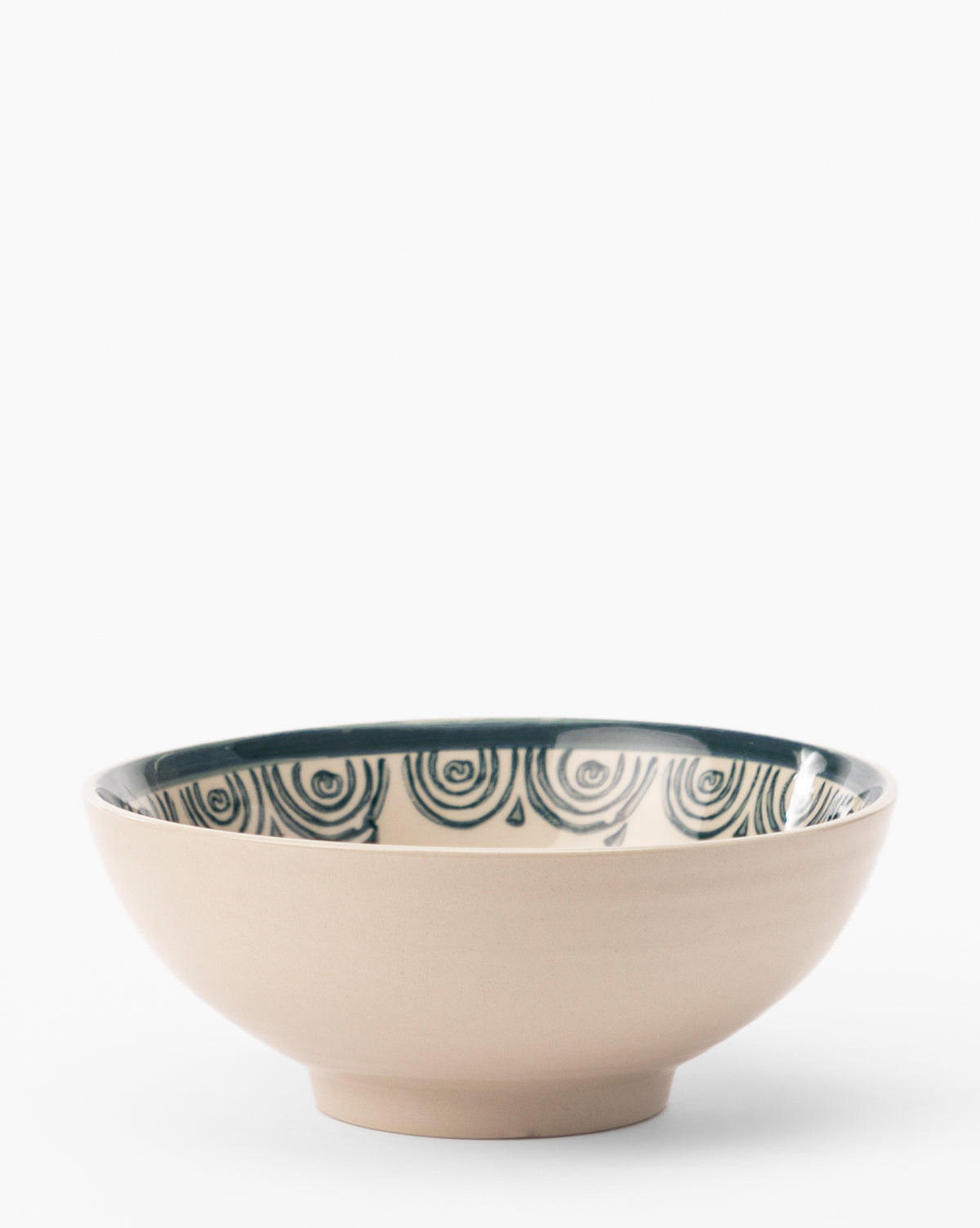 The Mattia Hand-Painted Bowl is a beige glazed stoneware piece with a circular base and wide rim, adorned with dark green hand-painted concentric semi-circles on the inner surface. Shown against a white background by McGee & Co.