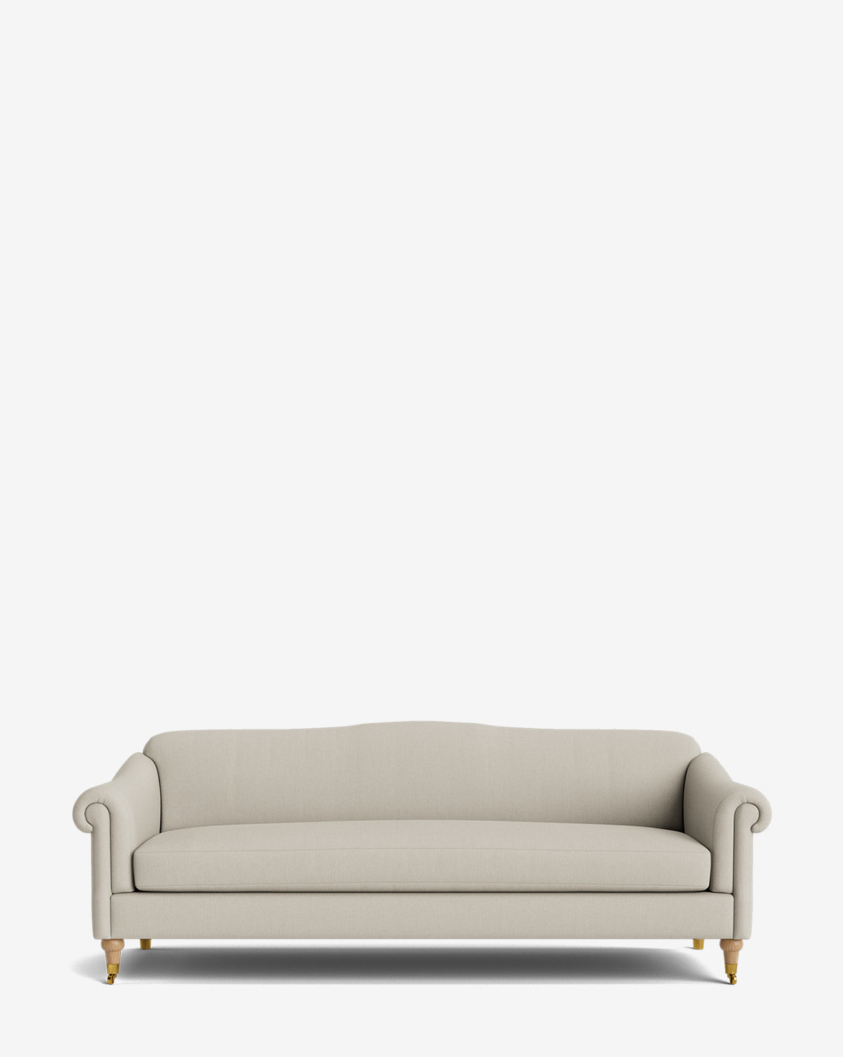 The Hildegard Sofa 90 is a light beige, handcrafted piece with rolled arms, a curved backrest, and wooden legs on small casters, displayed against a plain white background by McGee & Co.