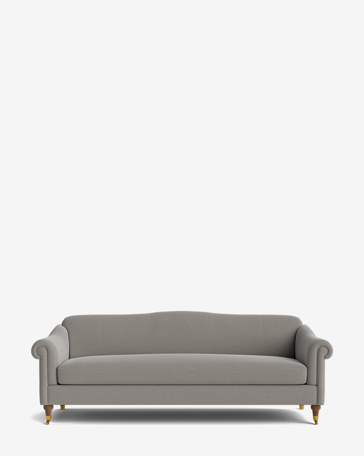 The Hildegard Sofa 90 is a modern light gray upholstered piece with rolled arms, a low backrest, and wooden legs with brass casters, beautifully handcrafted to stand out against a plain white background, by McGee & Co.