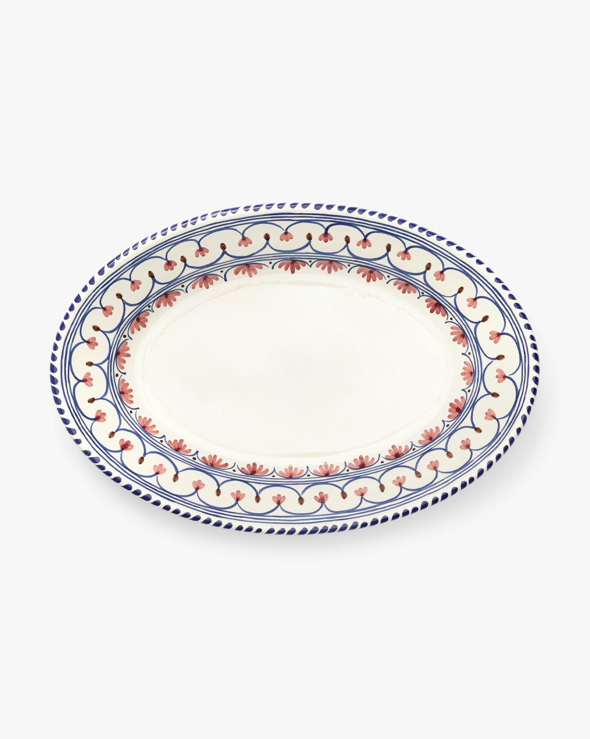 The Honor Serving Platter is an oval ceramic dish with a white base, featuring detailed red floral designs and blue leafy borders—an elegant piece from Sharland England, by McGee & Co.